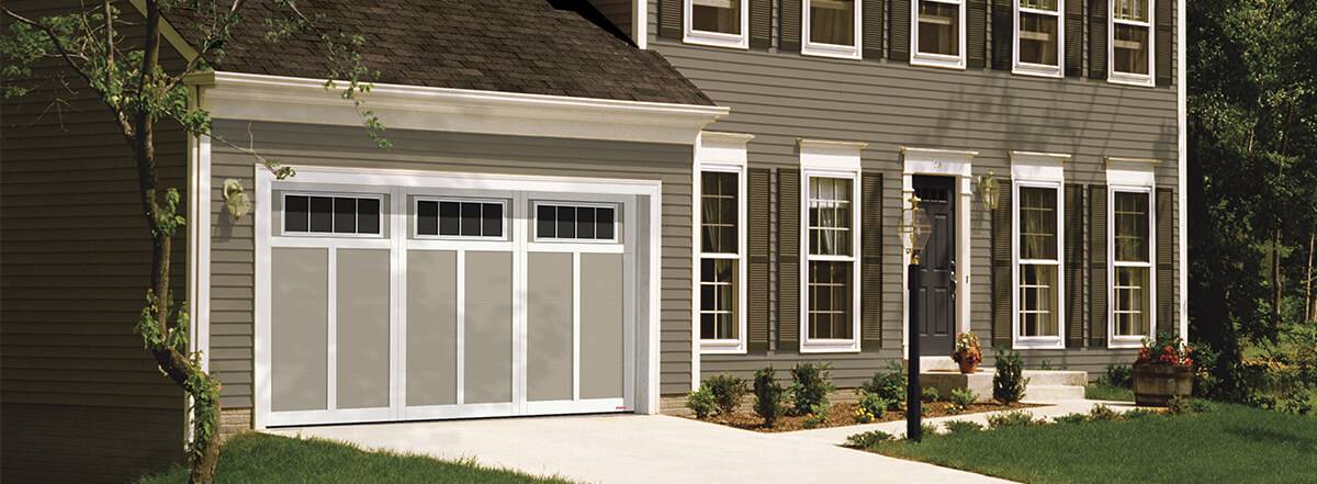 Eastman E-12, 14' x 7', Claystone door and Ice White overlays, 4 lite Orion windows